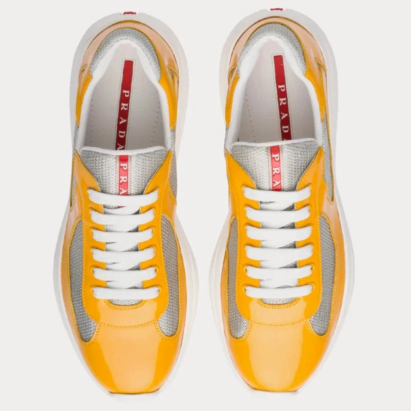 Prada Gold Patent Americas Cup Trainers - DANYOUNGUK